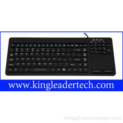 Waterproof slim silicone keyboard with integrated touchpad